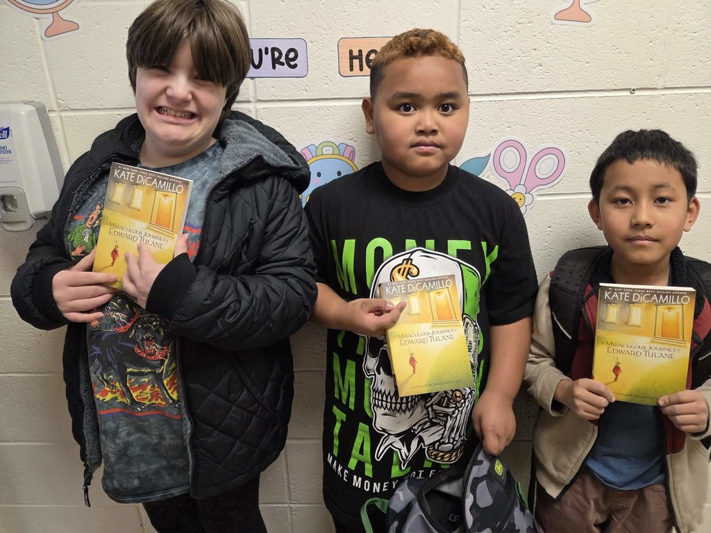 Students show off their books
