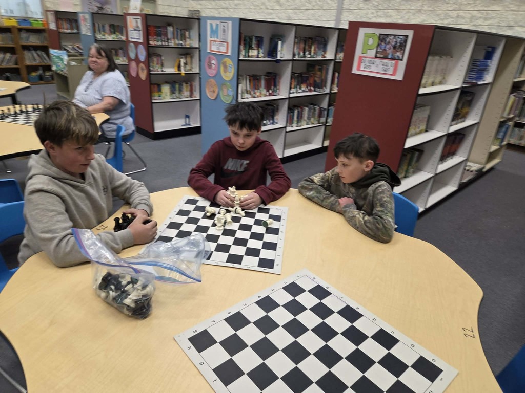 Students playing chess