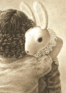 Child hugging toy rabbit