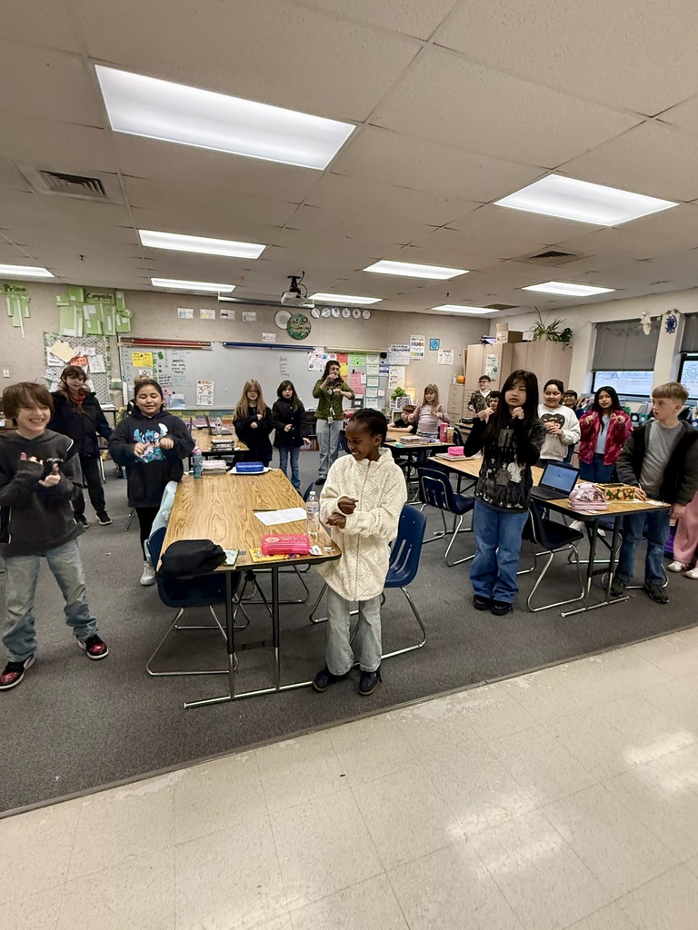 Whole Class doing motions to core values