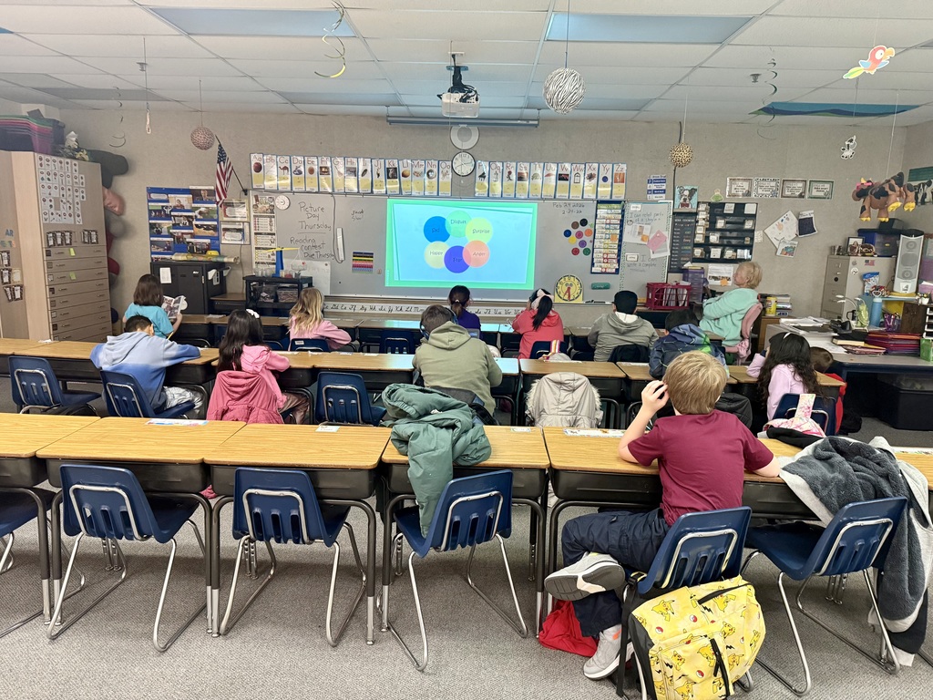 Students watching morning meeting lesson