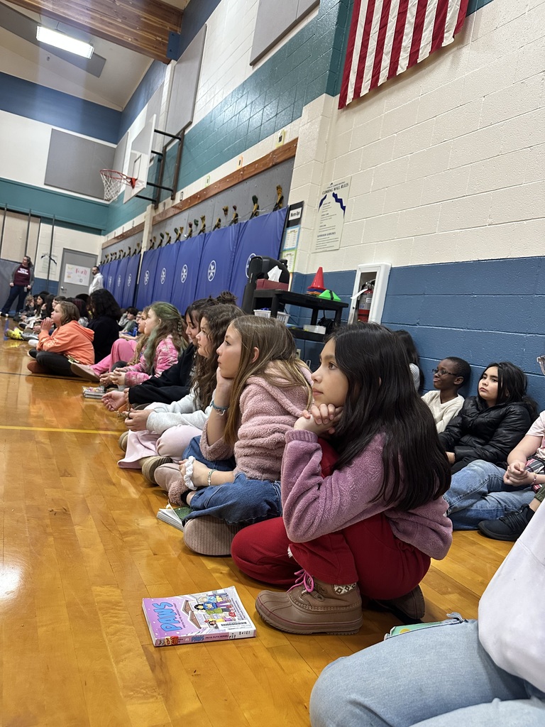 Students in gym patiently waiting