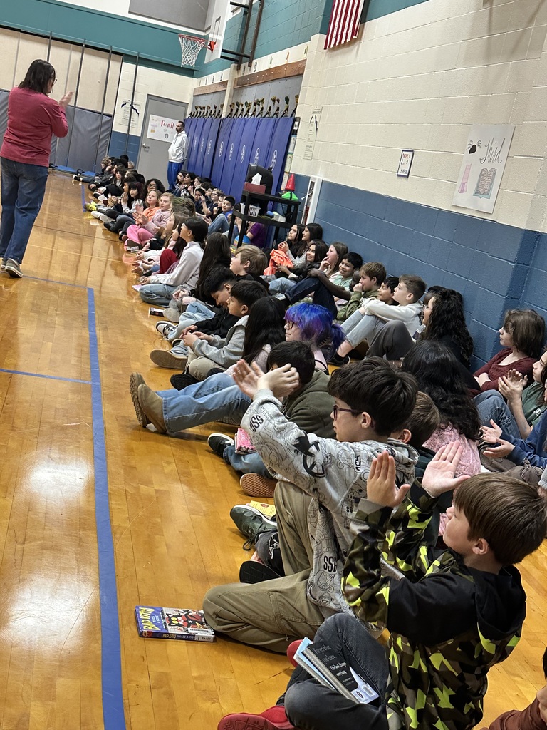 Students in gym patiently waiting