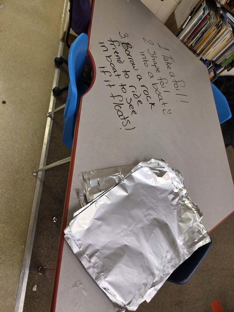 Families build ships out of foil