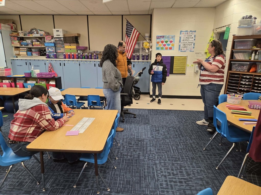 Families make a kindness chain.