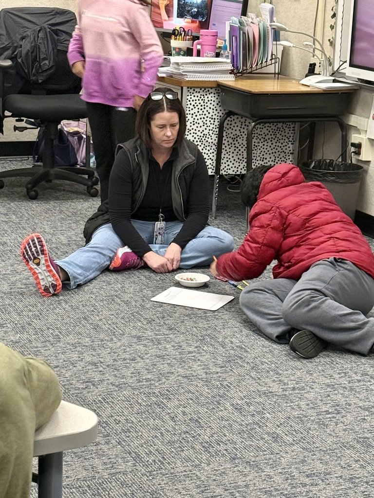 Teacher working one on one with student