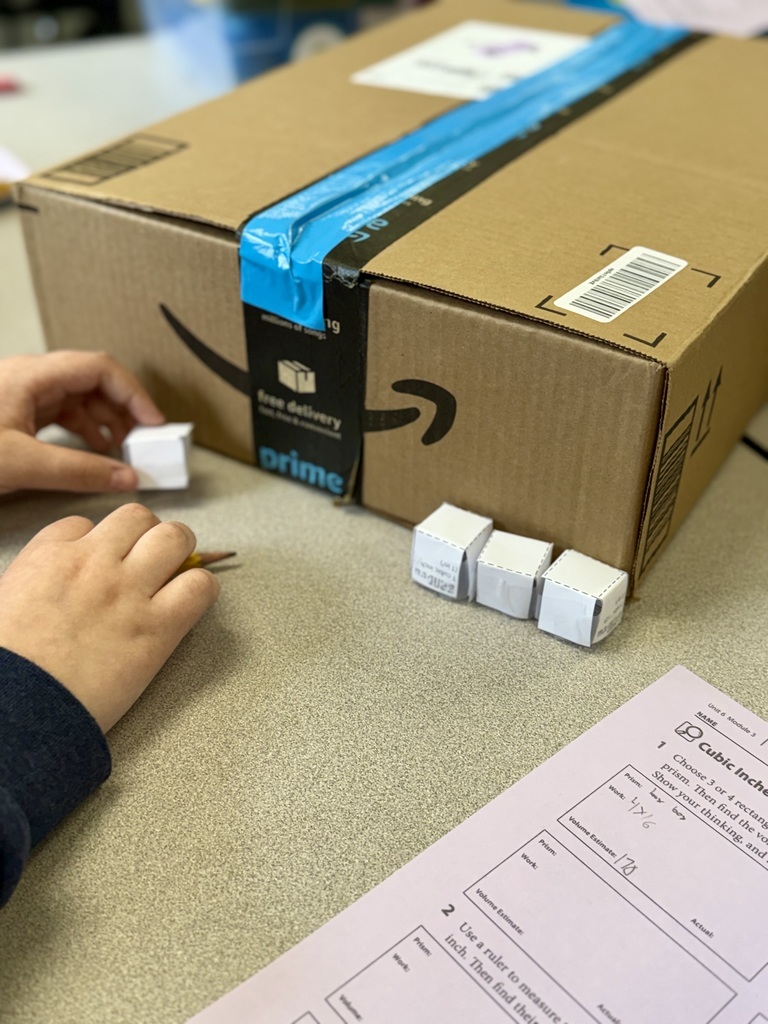 Measuring Boxes with Cubic Units