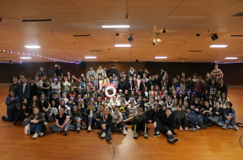 All the students pictured together at the roller skating rink