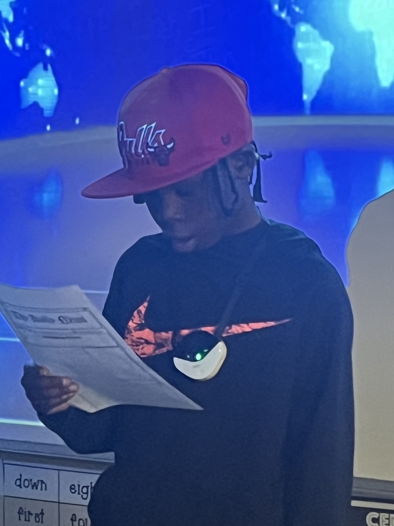 Student presenting a news story.