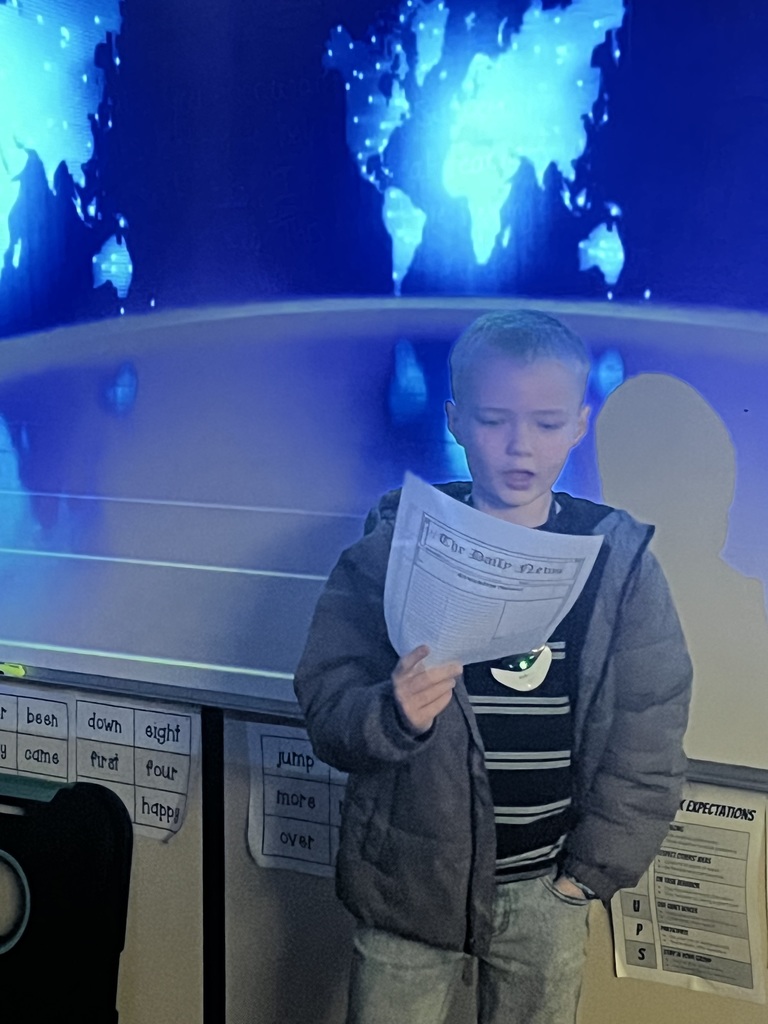 Student presenting a news story.
