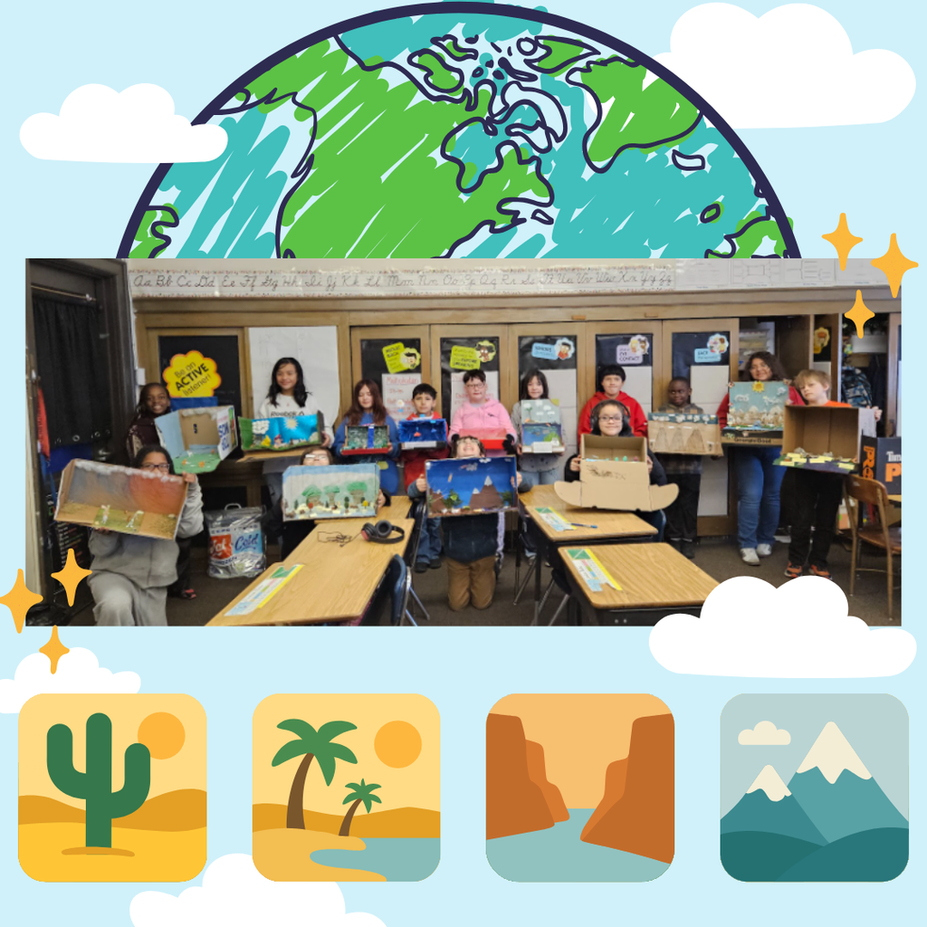 The class proudly displaying their dioramas