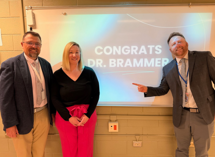 Dr. Brammer pictured with the superintendent and associate superintendent