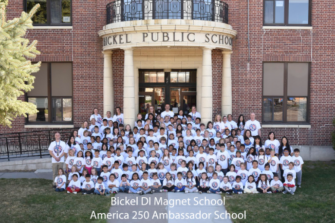 Bickel's students and staff pictures in front of the school building