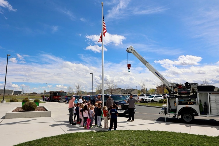Students looking at a crane