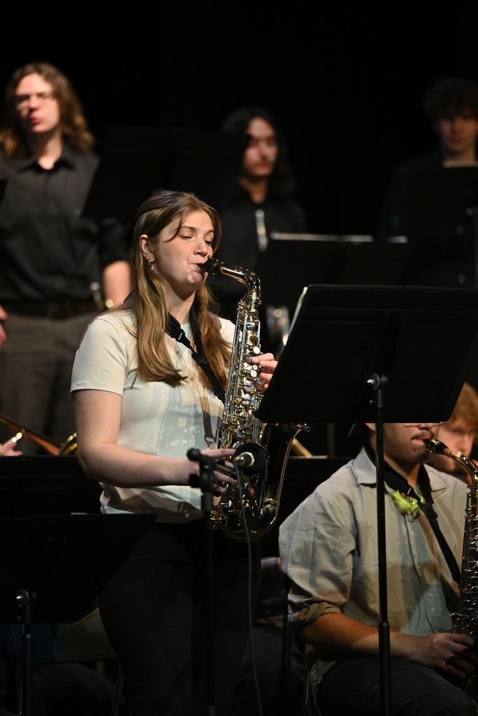 Female student playing an instrument