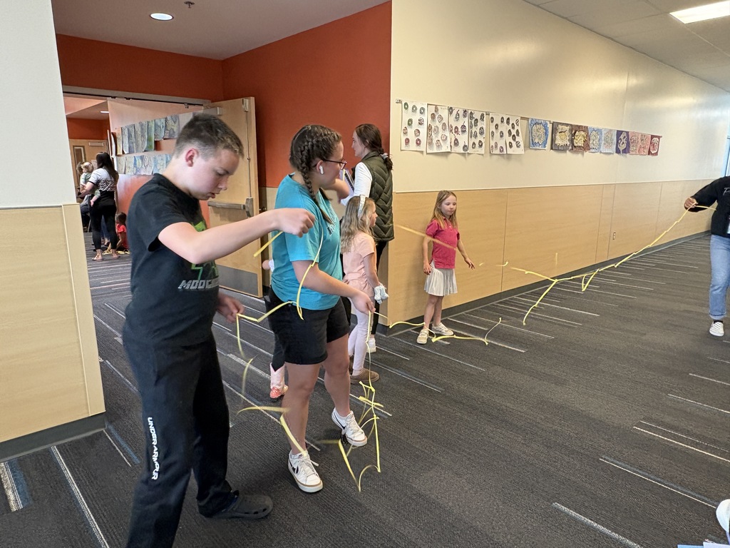 kids playing STEAM games with family and friends