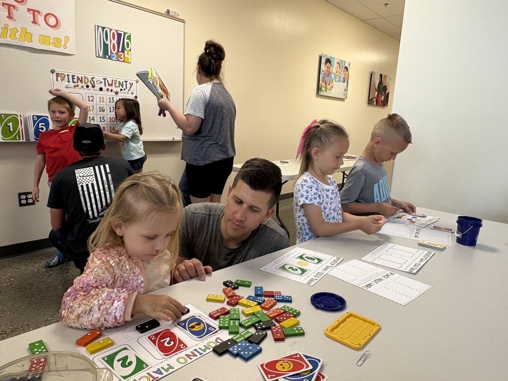 kids playing STEAM games with family and friends