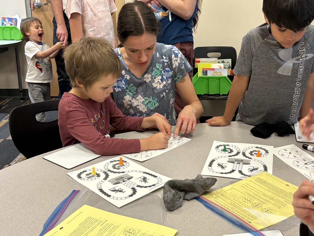 kids playing STEAM games with family and friends