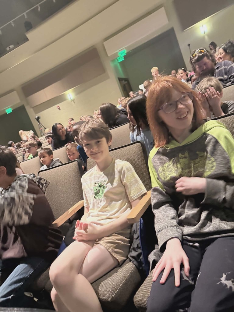 Students cheering at the Synergy performance