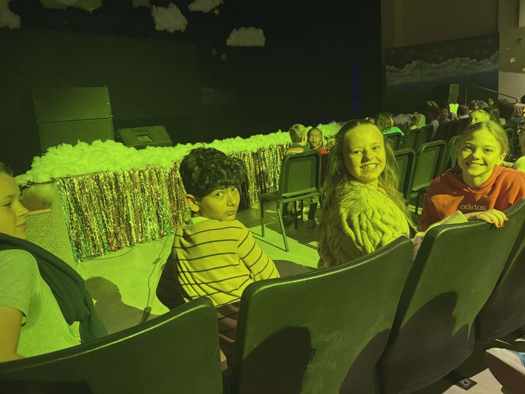 Students cheering at the Synergy performance