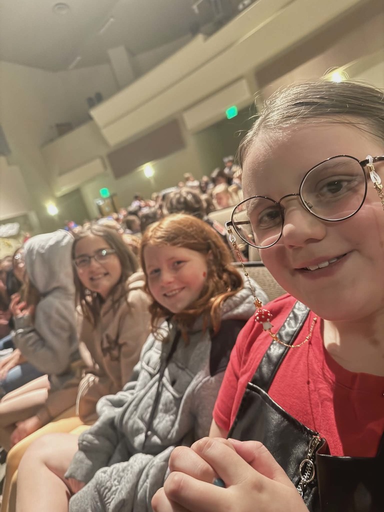 Students cheering at the Synergy performance