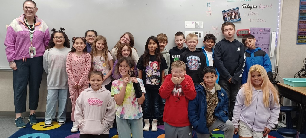 A classroom smiling together