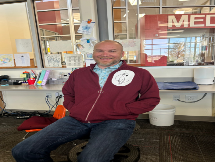 Mr. Clark showcasing his new custom zip up with the "Catman" logo 