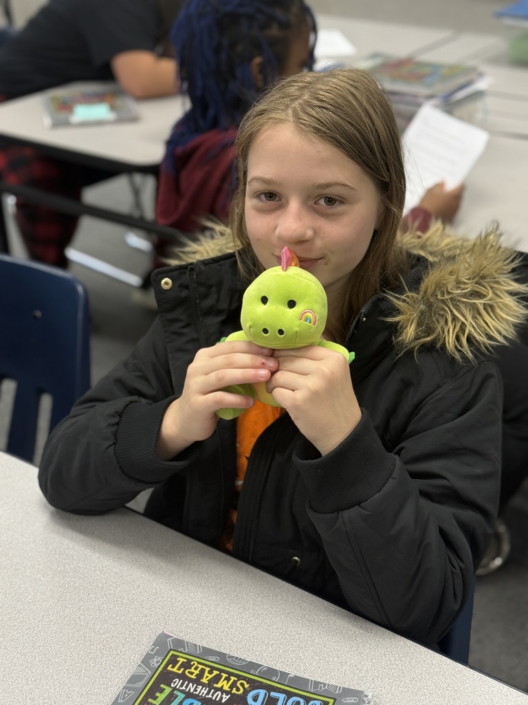 Student with her dinosaur