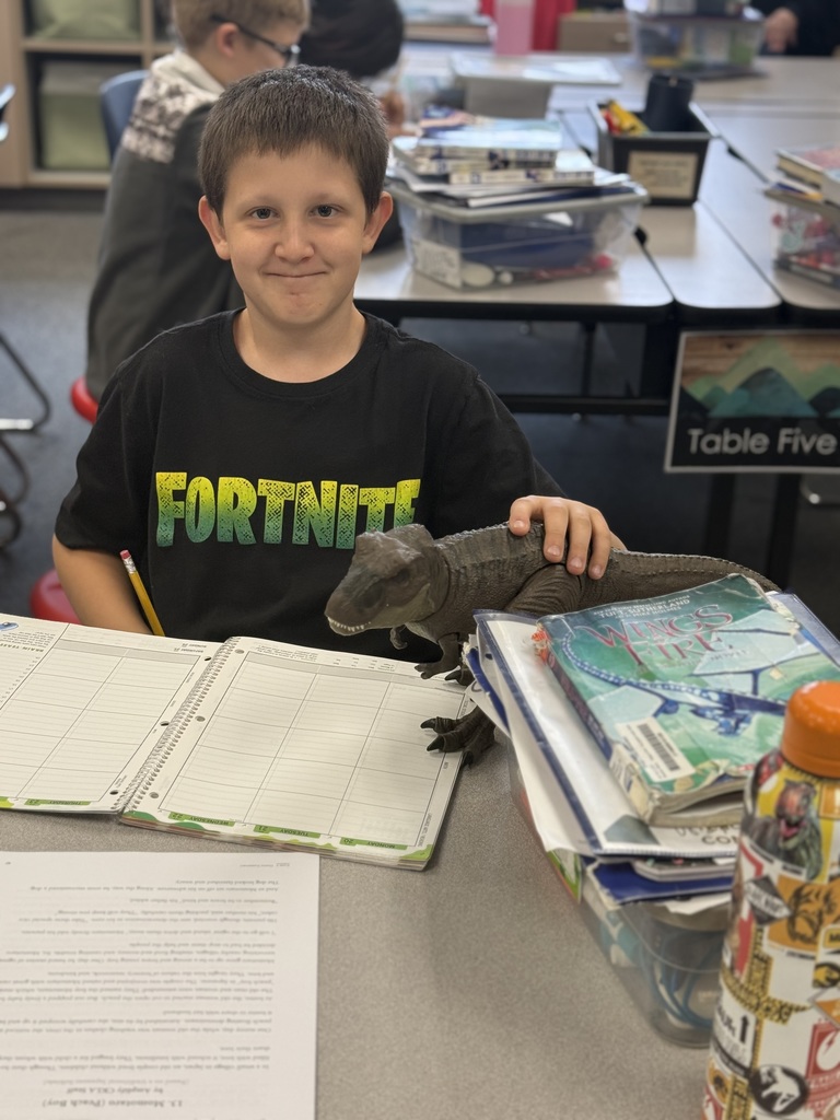 Student with his dinosaur