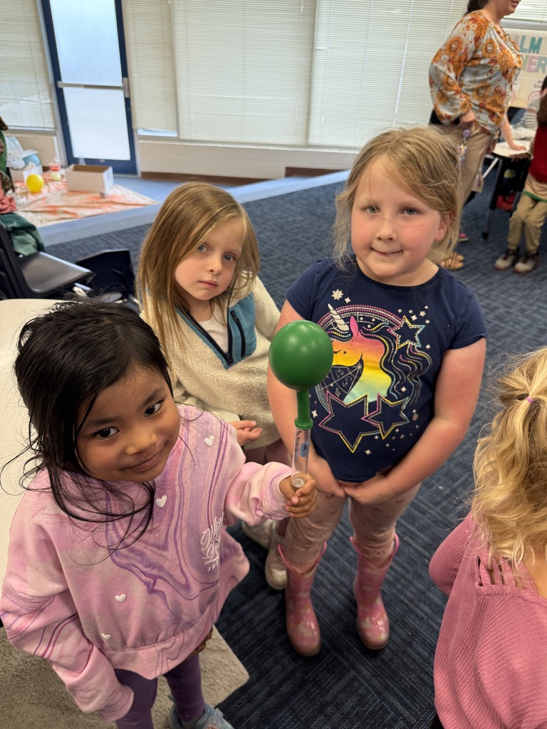 Happy students being scientists