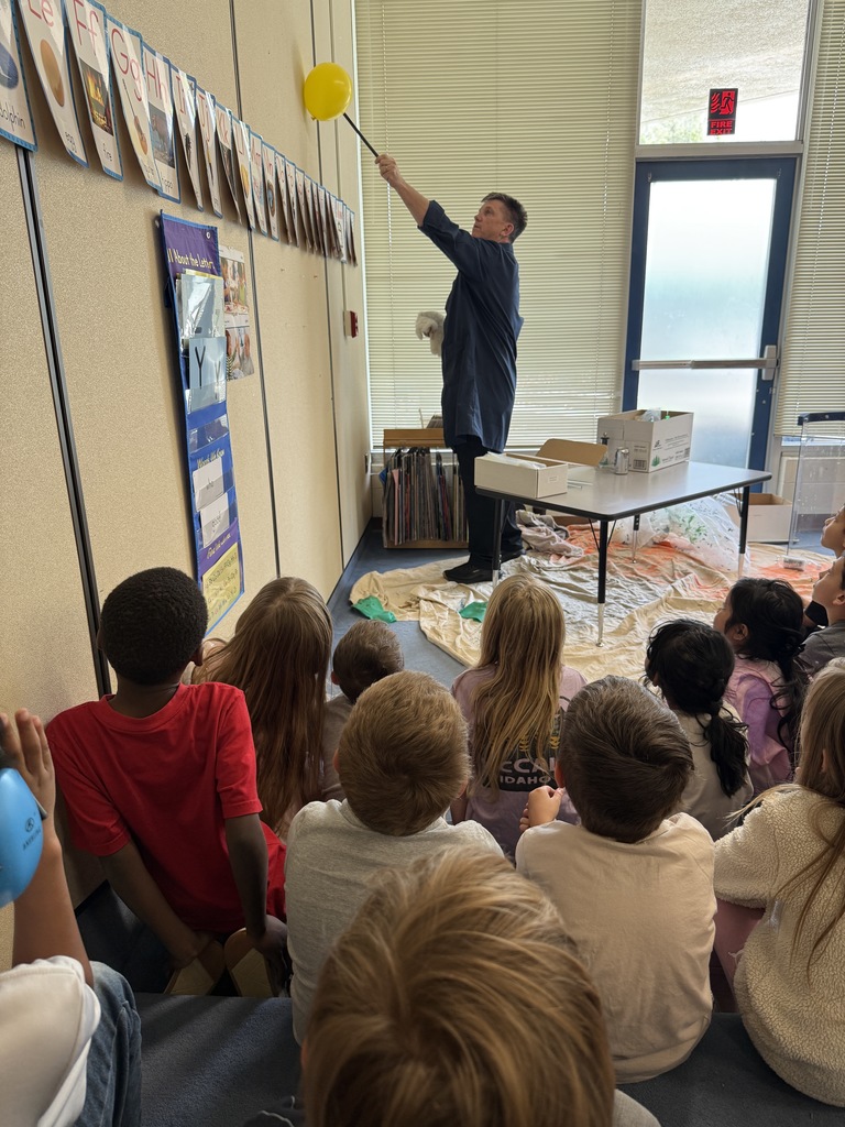 Mr. Franklin moving a balloon up a wall