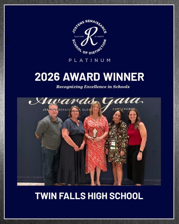 A group of people standing in front of a banner. Text reads "2026 Award Winner: Recognizing Excellence in Schools" and "Twin Falls High School".