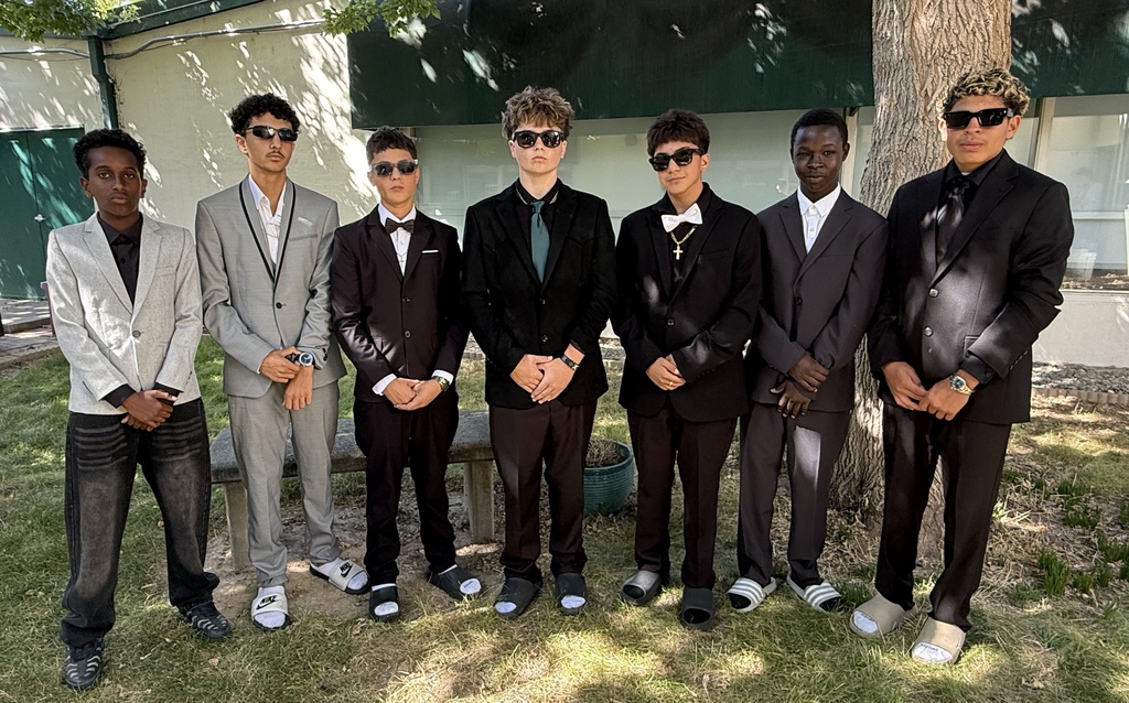 a picture of a group of boys dressed in suits