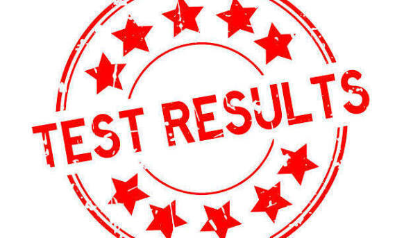 Round circle with stars that says test results