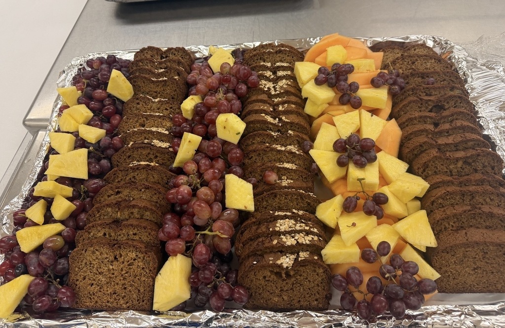 A tray of banana bread with fruit
