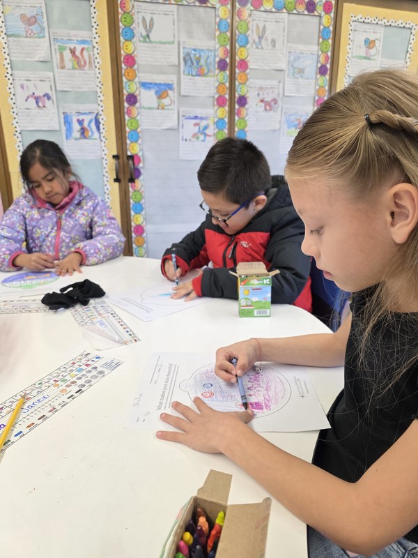 Students working on Christmas ornaments.