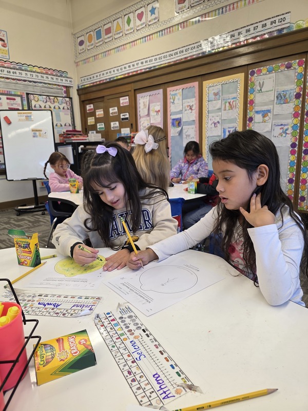 Students working on Christmas ornaments.