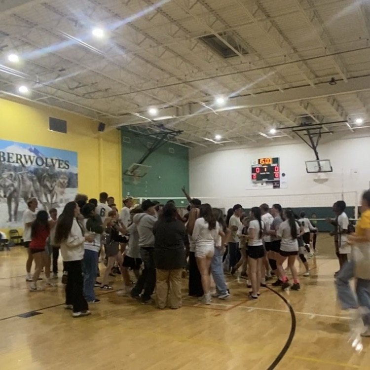 fans together around our athletes to celebrate the volleyball win