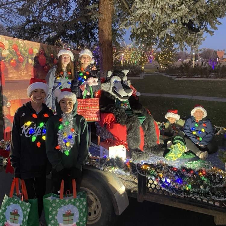 students and fan on the trailer for our float