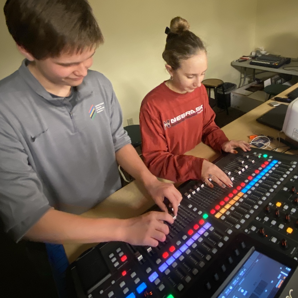 our Crew Heads for the spring musical using the sound board