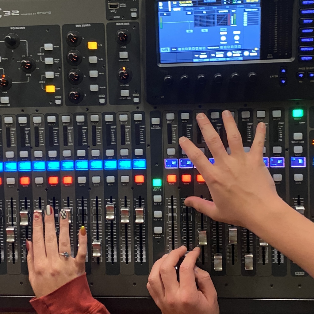 our Crew Heads for the spring musical using the sound board