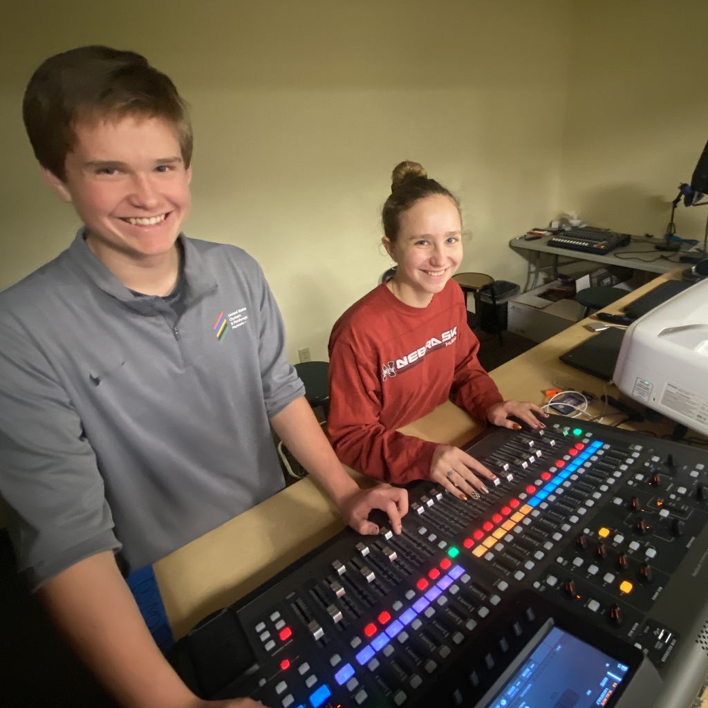 our Crew Heads for the spring musical using the sound board