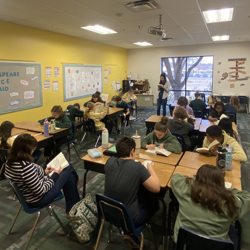 MS students reading together in a English Class