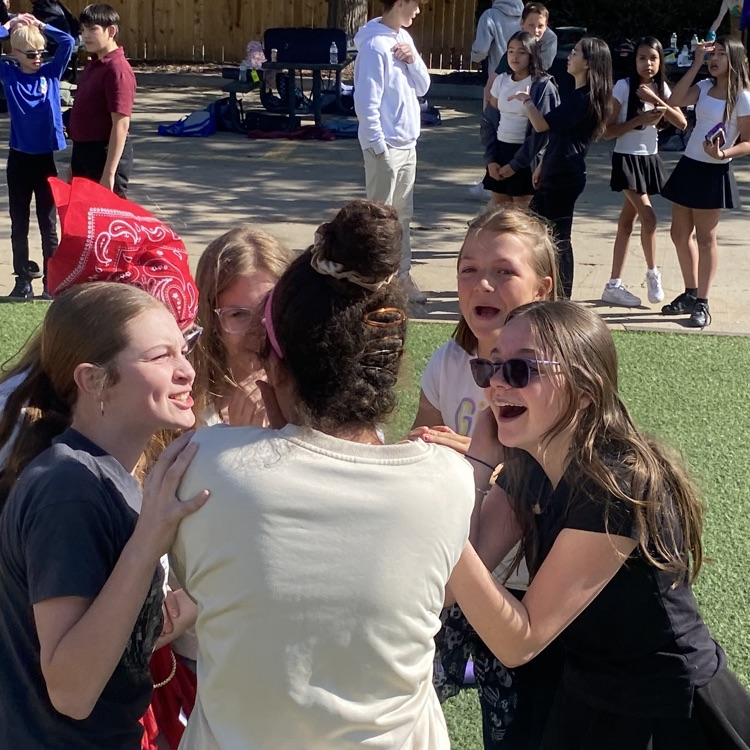students cheering for the winner