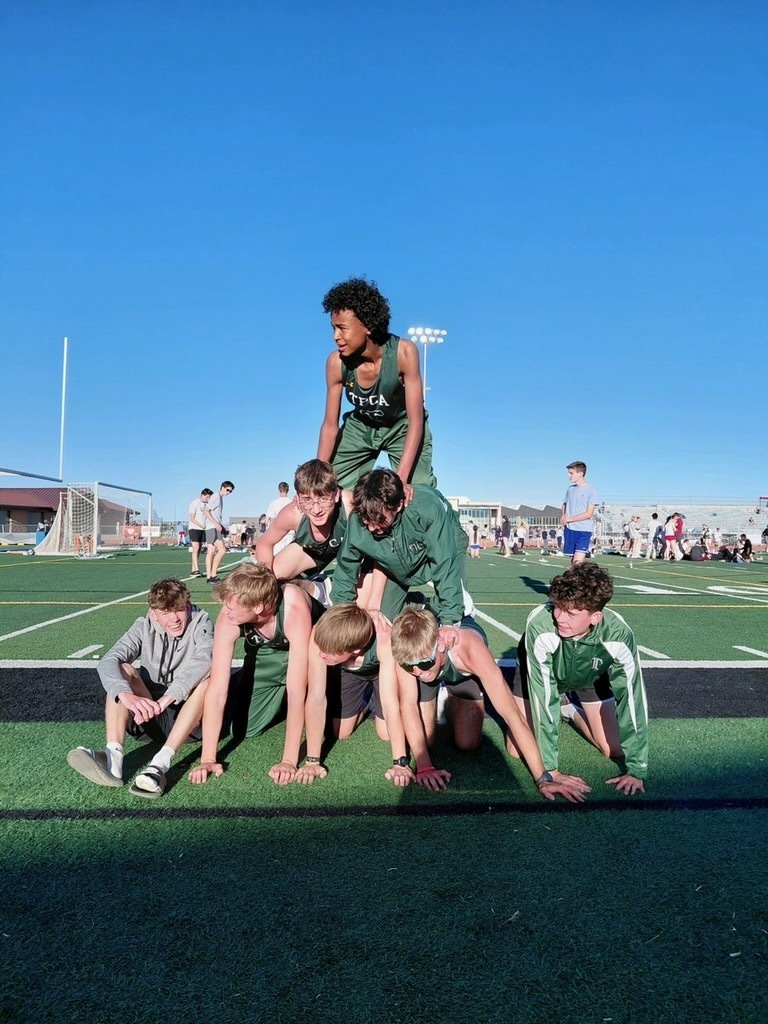 Pyramid by athletes at the meet