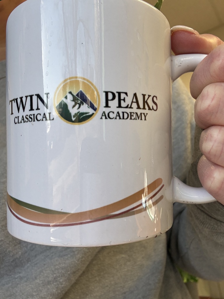 Twin Peaks Classical Academy logo on a coffee mug 