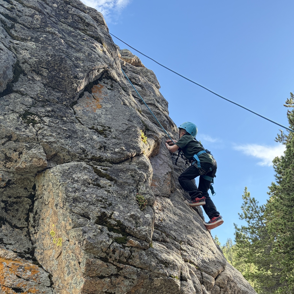 student climbing