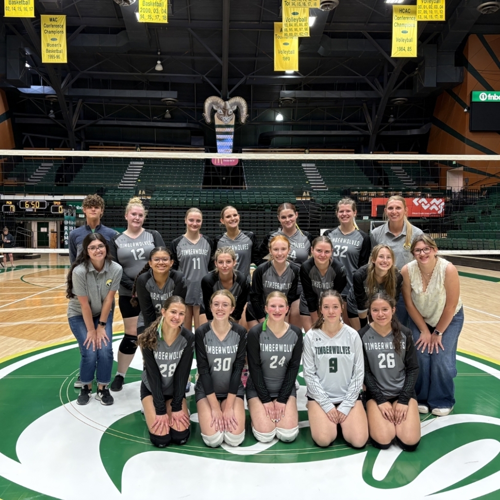team photo on the court at Moby