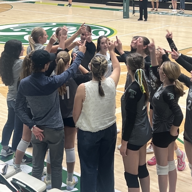 team huddle on the sidelines 