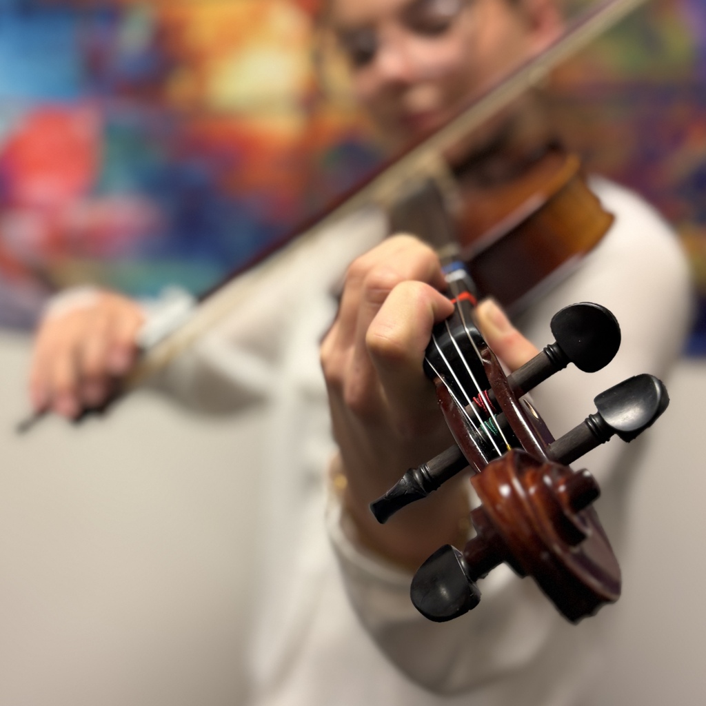 student playing violin
